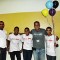 El director de Tecnología del Intec Erick Barinas y el Prof. Raydelto Hernandez junta al equipo ganador, C++, I Choose You!
